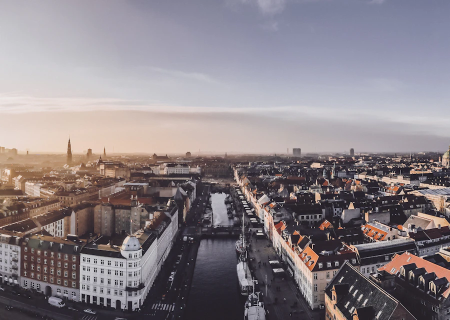 Copenhagen canal and rooftops at sunset