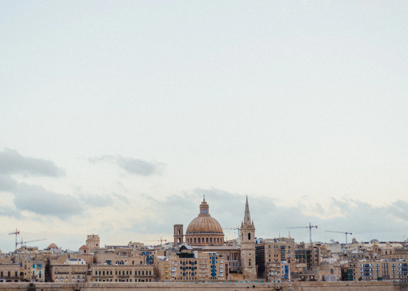 Valletta skyline across the blue Mediterranean water